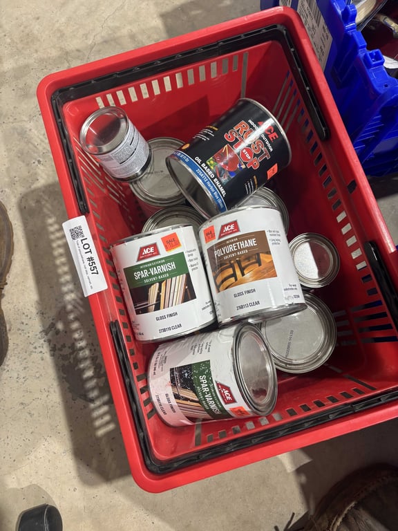Tote of polyurethane, rust stop, varnish, etc