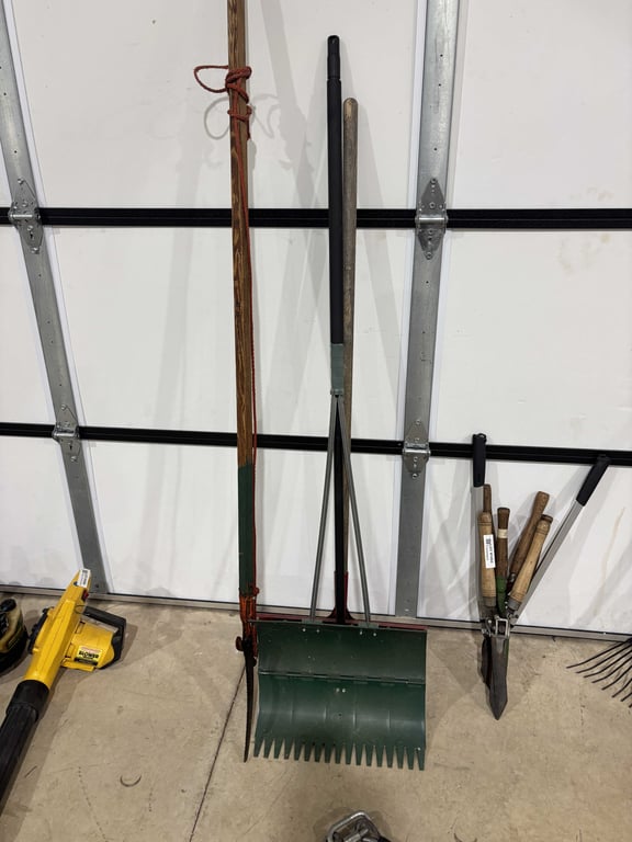 Polesaw and snow shovels