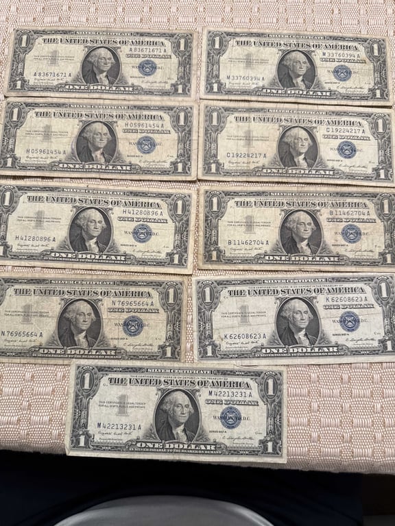(9) 1957 A $1.00 Silver Certificates