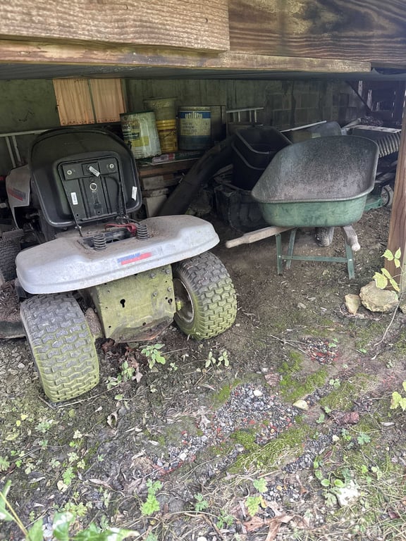 All items under Porch including lawn mower and snow blower