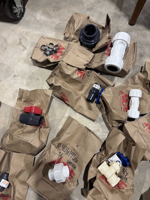 Tote of misc PVC fittings, faucet handles, misc - Image 6