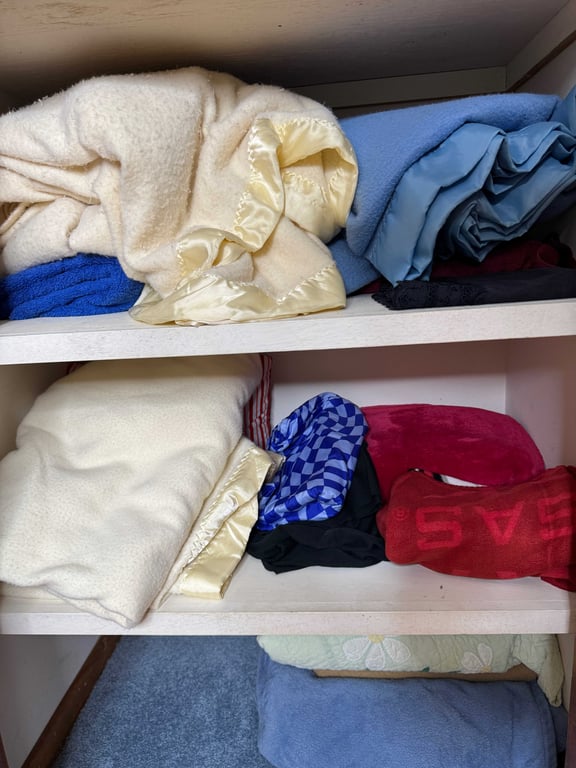 Closet with misc blankets, pillows, towels, etc - Image 3