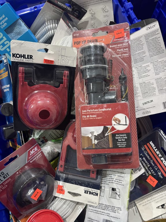 Tote of toilet flappers, spackling, toilet connectors, telephone line, extension cord, misc - Image 3
