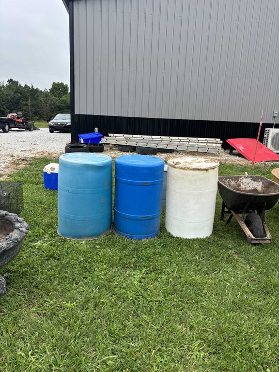 4 plastic barrels
