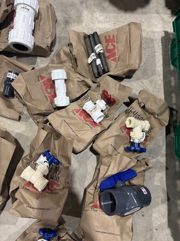 Tote of misc PVC fittings, faucet handles, misc - Image 5