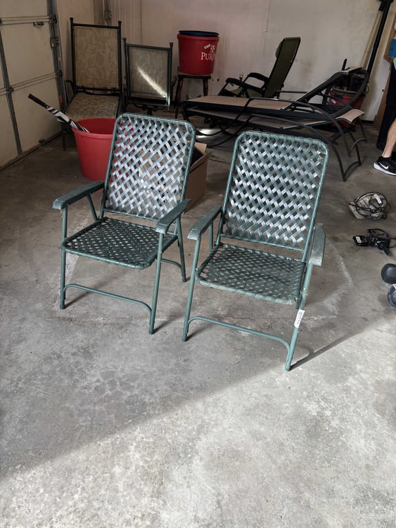 Two Plastic Lawn Chairs