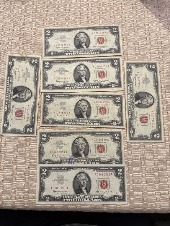 (7) $2.00 Red Seals.