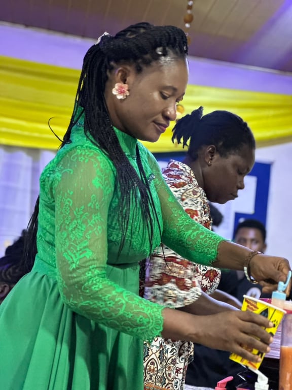 A church member serving drinks during a fellowship gathering