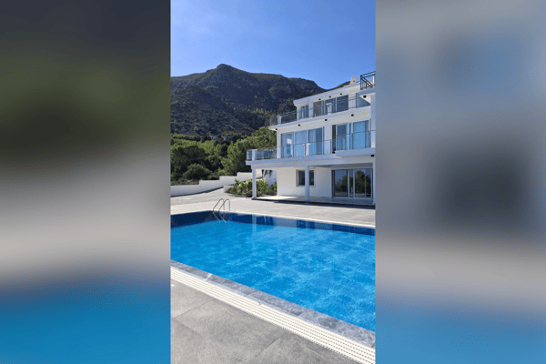 Poolside view, slightly blurred center, emphasizing clean water and pool tiling.