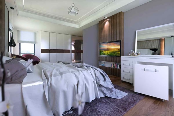 Stylish bedroom with plush linens, soft lighting, and a white wardrobe complementing the decor
