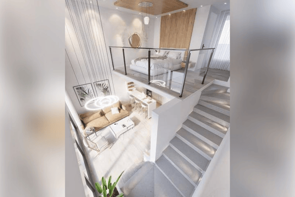 Loft view revealing staircase and vertical space, showcasing the architectural elegance of a modern duplex design.