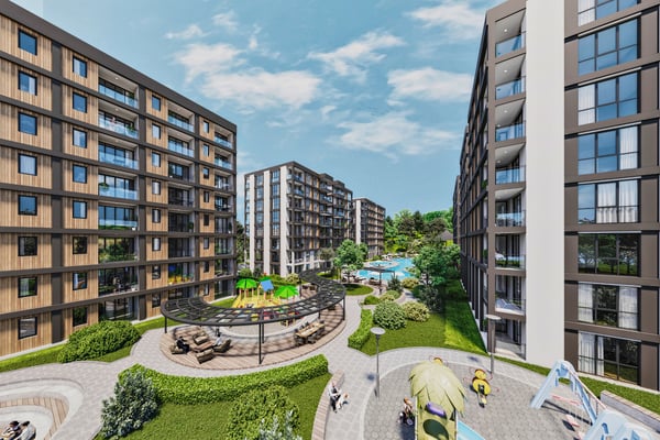 Communal garden area with walking paths and seating, providing a relaxed, family-friendly outdoor environment.
