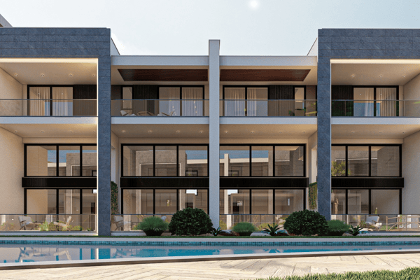 Rear building elevation with multiple balconies overlooking a pool and lushly maintained communal green space.