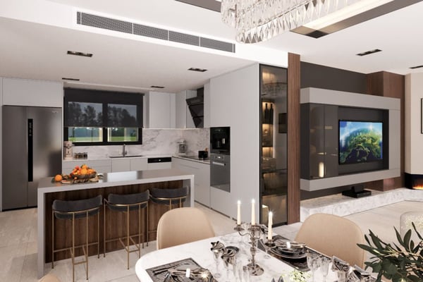 Dining area transitions into minimalist kitchen with white countertops and open-concept design.