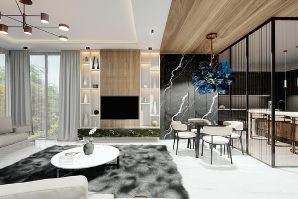 Small lounge with two accent chairs, a stylish side table, and wall sconces, creating an intimate seating area.