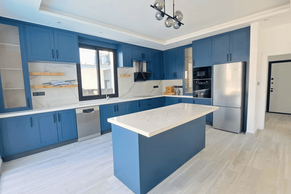 Compact and stylish kitchen layout with modern finishes and high-quality fixtures.