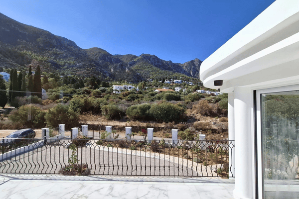 Similar terrace view with decorative fencing.