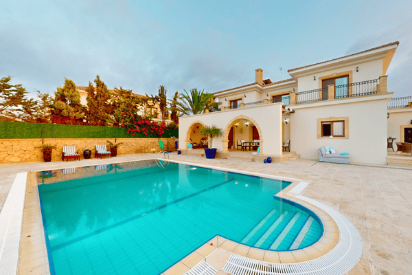 Discover the charm of Mediterranean living in this sea-front villa, offering panoramic views, timeless architecture, and a private retreat on the coast of North Cyprus.
