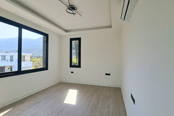 Compact room suited for study, office, or child's bedroom.