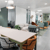 Illustration showcasing two distinct coworking spaces in North Cyprus: Nomad Space, a beachfront workspace with 24/7 access and outdoor seating for creative inspiration, and Innovation Lab, a tech hub offering private offices, startup mentorship programs, and collaborative event spaces. The visual highlights flexible membership options and a thriving entrepreneurial community.