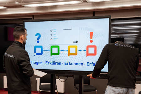 Smartboard installation by a technician in the classroom, including presentation equipment