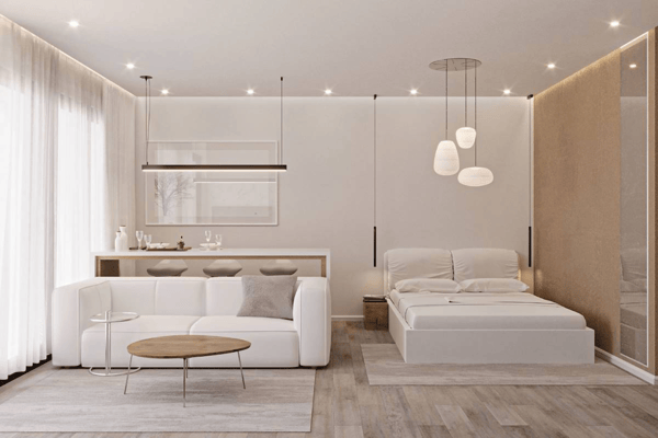 Serene apartment bedroom sanctuary featuring a comfortable double bed with upholstered headboard, stylish bedside tables, lamps, and sleek wardrobes.