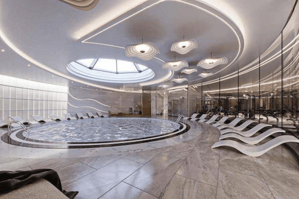 Indoor spa area with circular ceiling design and serene vibe, emphasizing luxurious wellness and privacy.