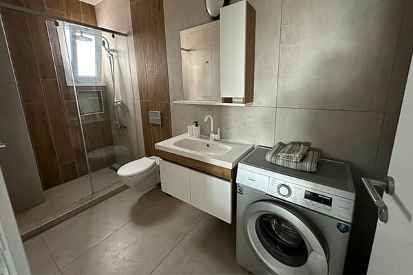 Open-concept layout showcasing a seamless transition between living and bedroom spaces.