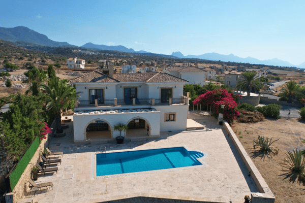 Bird’s-eye view highlighting the layout of the villa and pool area, revealing its spacious plot and privacy.