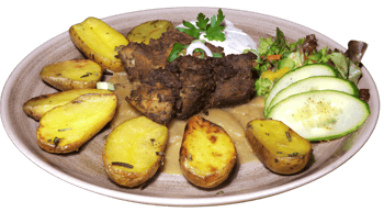 Chrupiący mutzbraten z chlebem czosnkowym i surówką w zajeździe Bad Düben — restauracja Bad Düben
