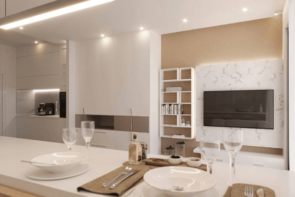 A cleverly designed corner utilized as a personal vanity or dressing table area within the apartment, complete with elegant table, mirror, and seat.
