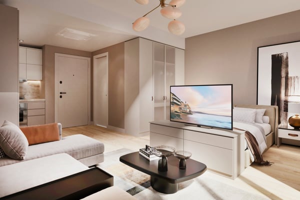 Living room featuring soft lighting and clean design, creating a cozy and inviting modern lifestyle space.