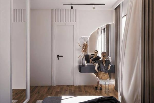 Sleek hallway with clean-lined doors leading to private areas, maintaining the home’s cohesive style.