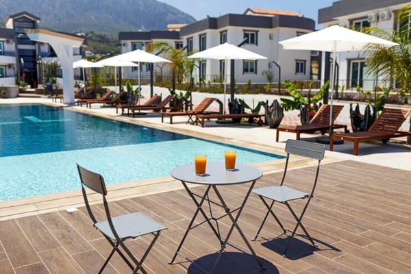 Experience a bright and modern apartment designed for effortless comfort and style, set within a secure complex offering on-site amenities and close proximity to coastal charm and urban essentials.