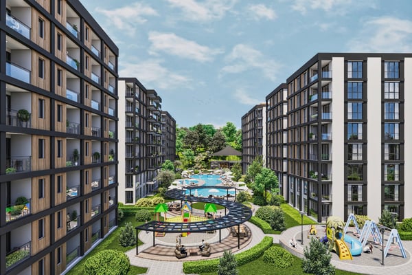 Water features blend with palm-filled greenery to create a calming connection between nature and elegant architecture.