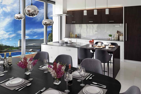 Elegant dining area with a panoramic glass window overlooking a scenic view, set with floral arrangements