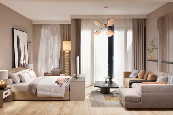 Bright studio lounge area with sleek furniture and minimal décor, reflecting a tranquil and elegant vibe.