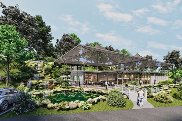 Clubhouse designed with natural materials and surrounded by greenery, creating a serene wellness retreat feel.