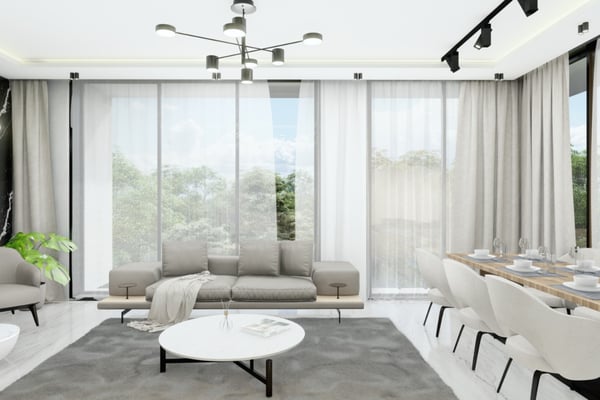 Neutral-toned bedroom with beige bedding, minimalist artwork, and soft lighting, creating a calming retreat.