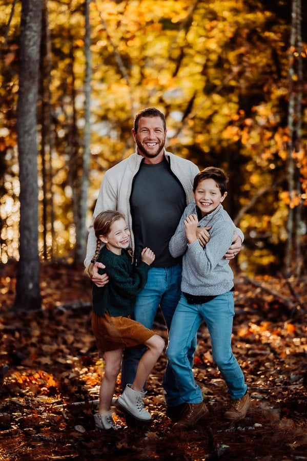 Father with son and daughter in woods