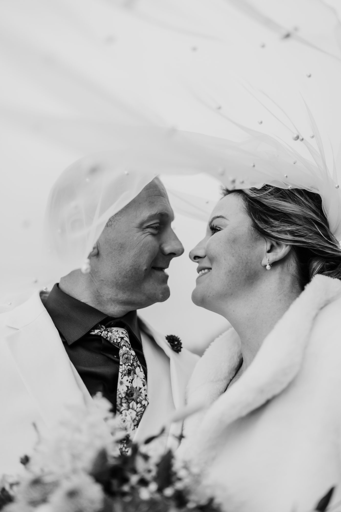 Black and white veil portrait during coastal elopement in Acadia National Park.