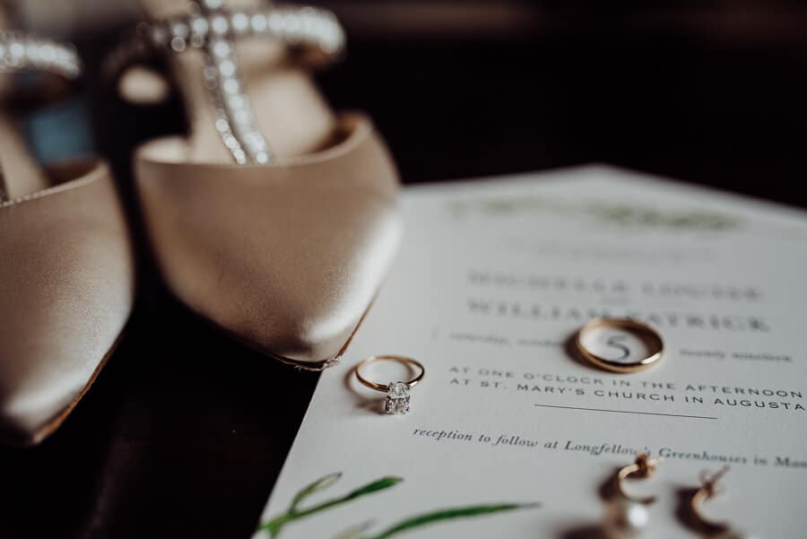 Wedding ring and invitation to augusta wedding