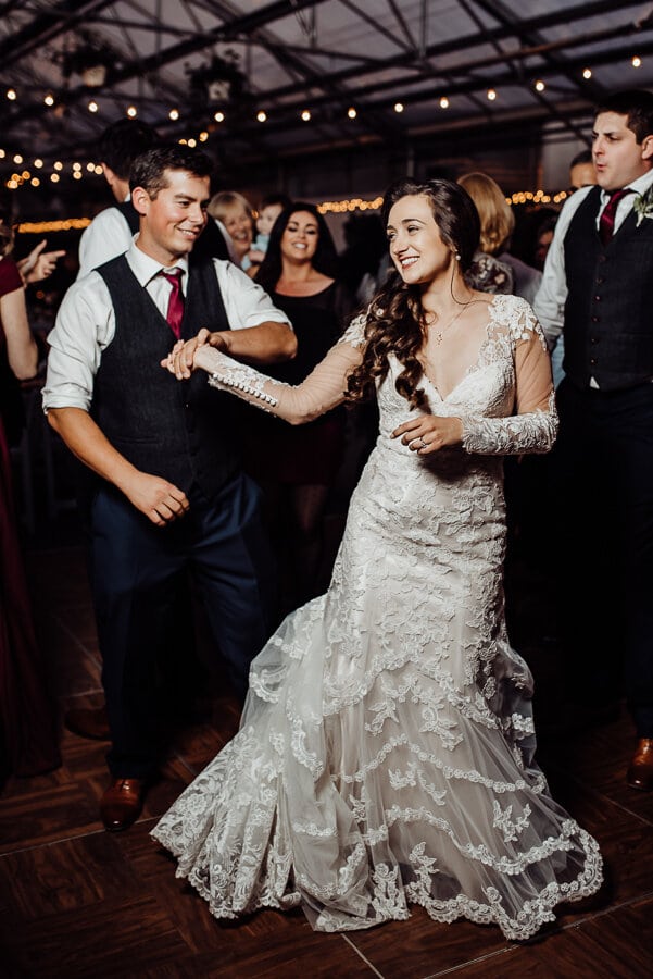 Bride dancing with groom at wedding