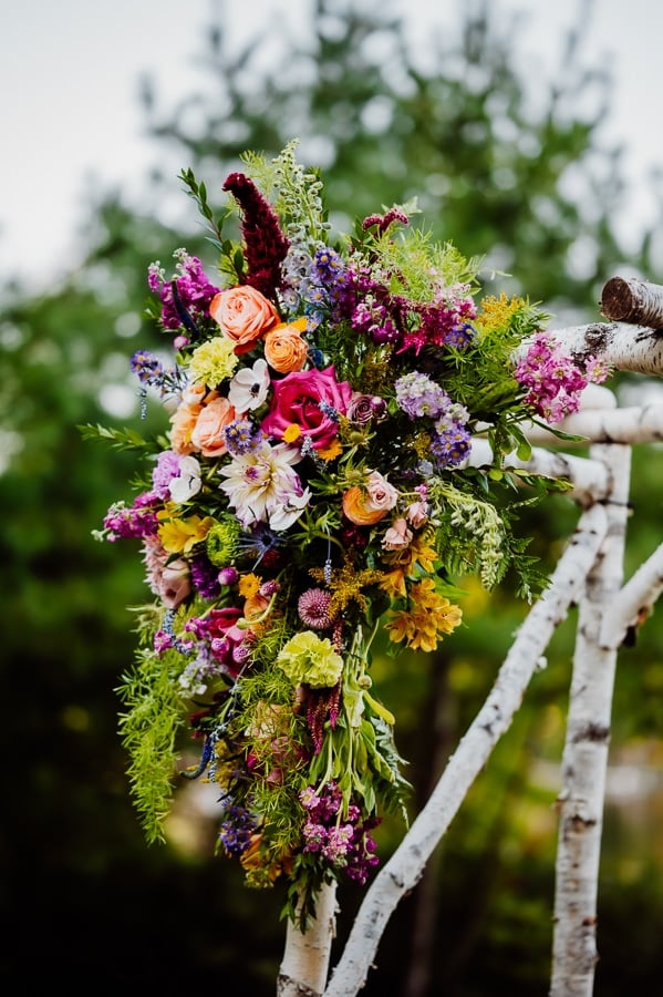 floral arrangement on wedding alter