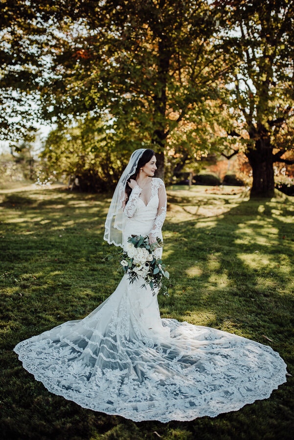 bride with long wedding dress train