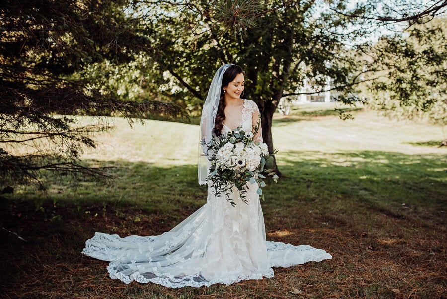 Maine Bride holding flowers