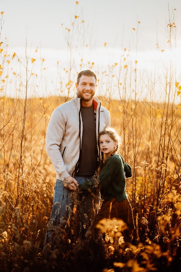 Father and daughter smiling together