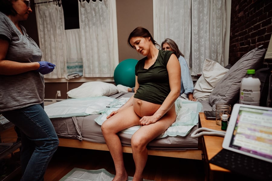 Woman giving birth at Holly No 7 birth Center Bangor Maine