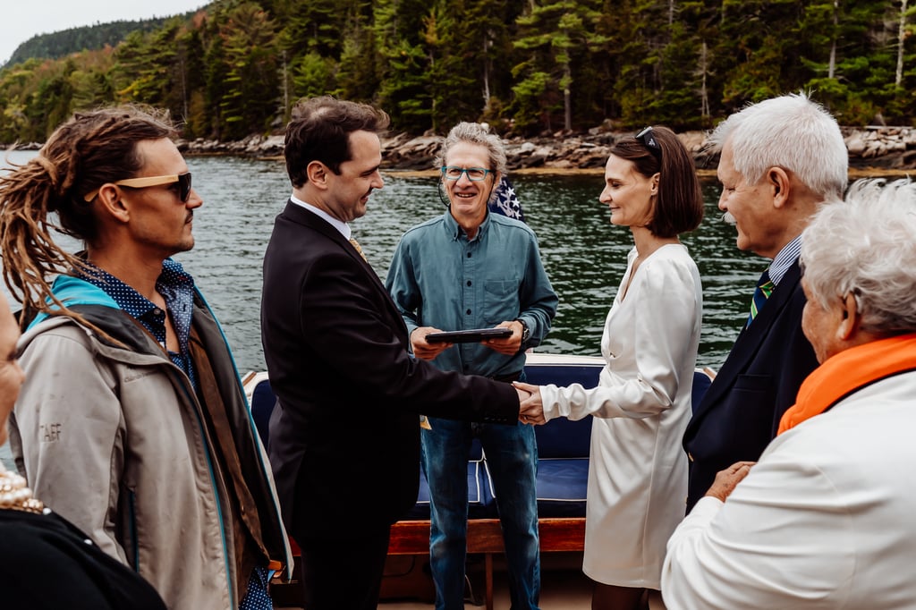 Bride and groom getting married on Jericho Boat