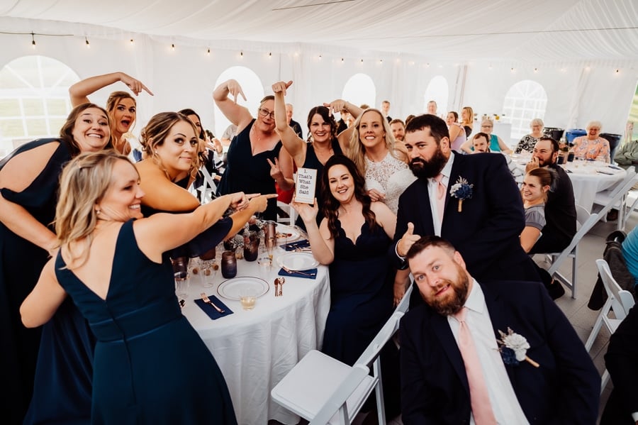bridesmaids holding sign that says thats what she said